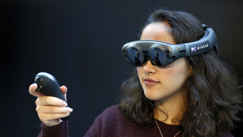 PARIS, FRANCE - NOVEMBER 21: A visitor tries a virtual reality helmet Magic Leap One during the Virtuality Paris 2019 show on November 21, 2019 in Paris, France. Magic Leap is an American startup working on augmented reality technology. The virtual reality show and immersive technologies, Virtuality takes place from 21 to 23 November 2019 in Paris. (Photo by Chesnot/Getty Images)