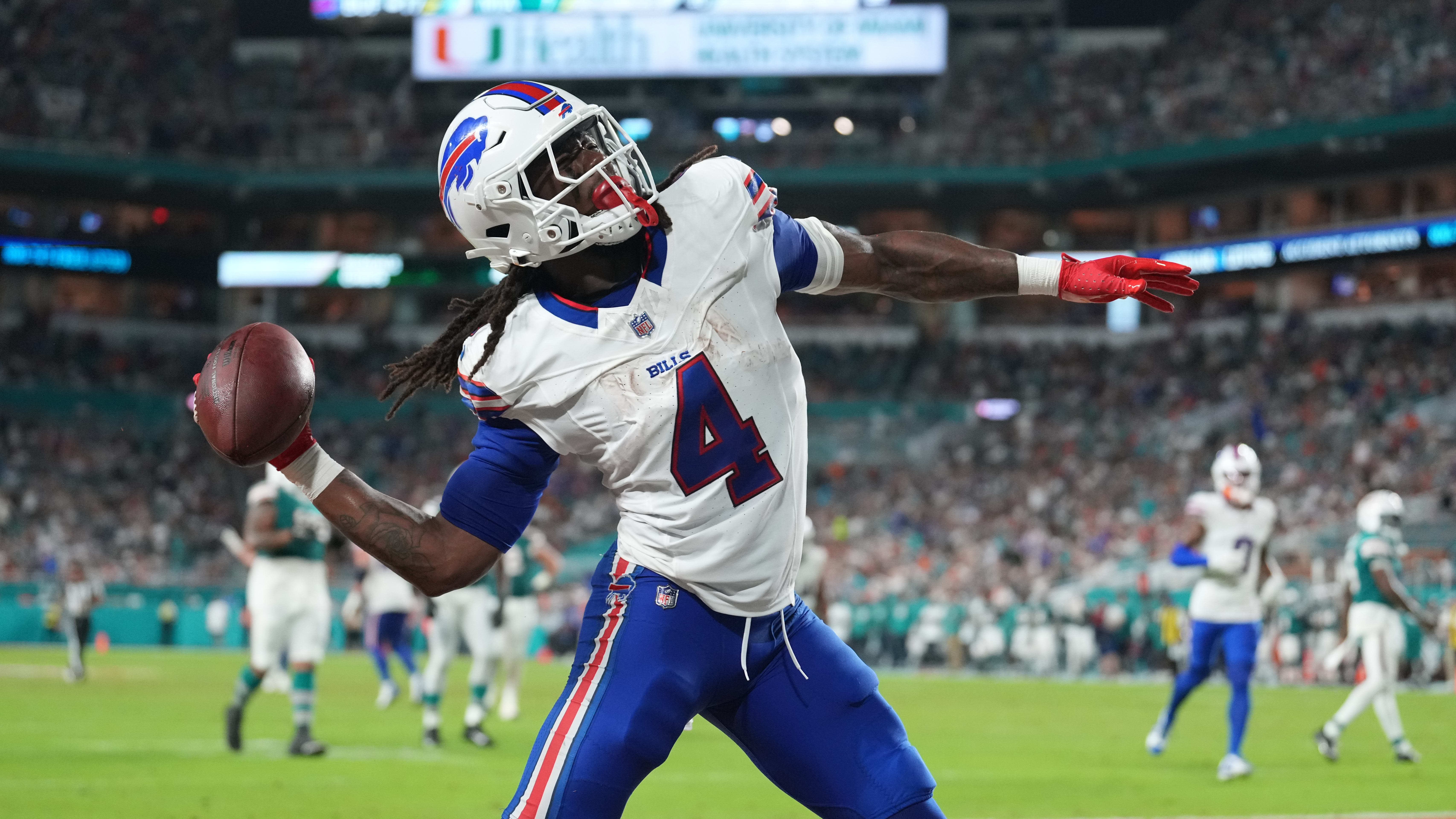 Bills' James Cook serves up 3 TDs to dismantle Dolphins, who lose Tua after hard hit