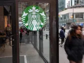 Starbucks' stock continues to struggle as competition heats up in the US, overseas