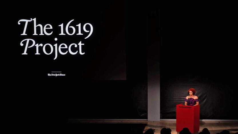 A promotional still with text logo and spotlighted speaker at a podium, for The 1619 Project by The New York Times.