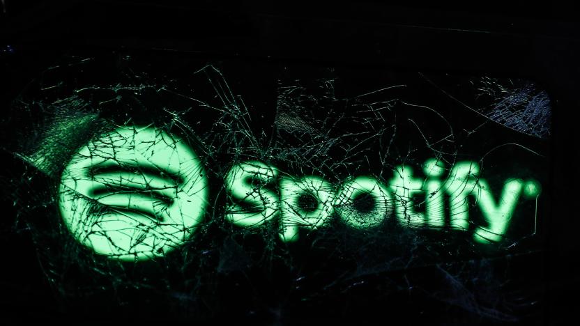 Spotify logo displayed on a phone screen is seen through a broken glass in this illustration photo taken in Krakow, Poland on February 14, 2022. (Photo by Jakub Porzycki/NurPhoto via Getty Images)