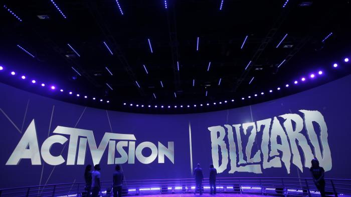FILE - The Activision Blizzard Booth during the Electronic Entertainment Expo in Los Angeles, June 13, 2013. The Federal Trade Commission said Thursday, Dec. 8, 2022, that it is suing to block Microsoft’s planned $69 billion takeover of video game company Activision Blizzard, saying it could suppress competitors to its Xbox game consoles and its growing games subscription business. (AP Photo/Jae C. Hong, File)