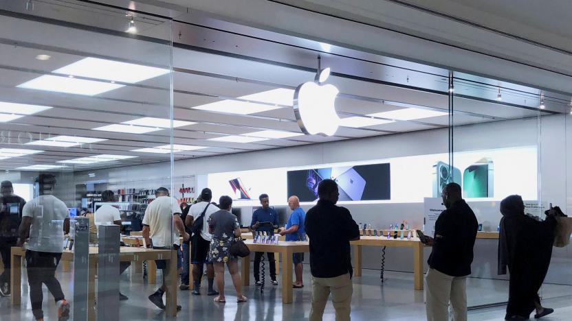 People visit the Apple store at the Cumberland Mall in Atlanta, Georgia, U.S., May 3, 2022. REUTERS/Alyssa Pointer