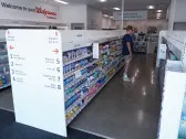 Drugstores tinker with new looks as their usual way of doing business faces challenges