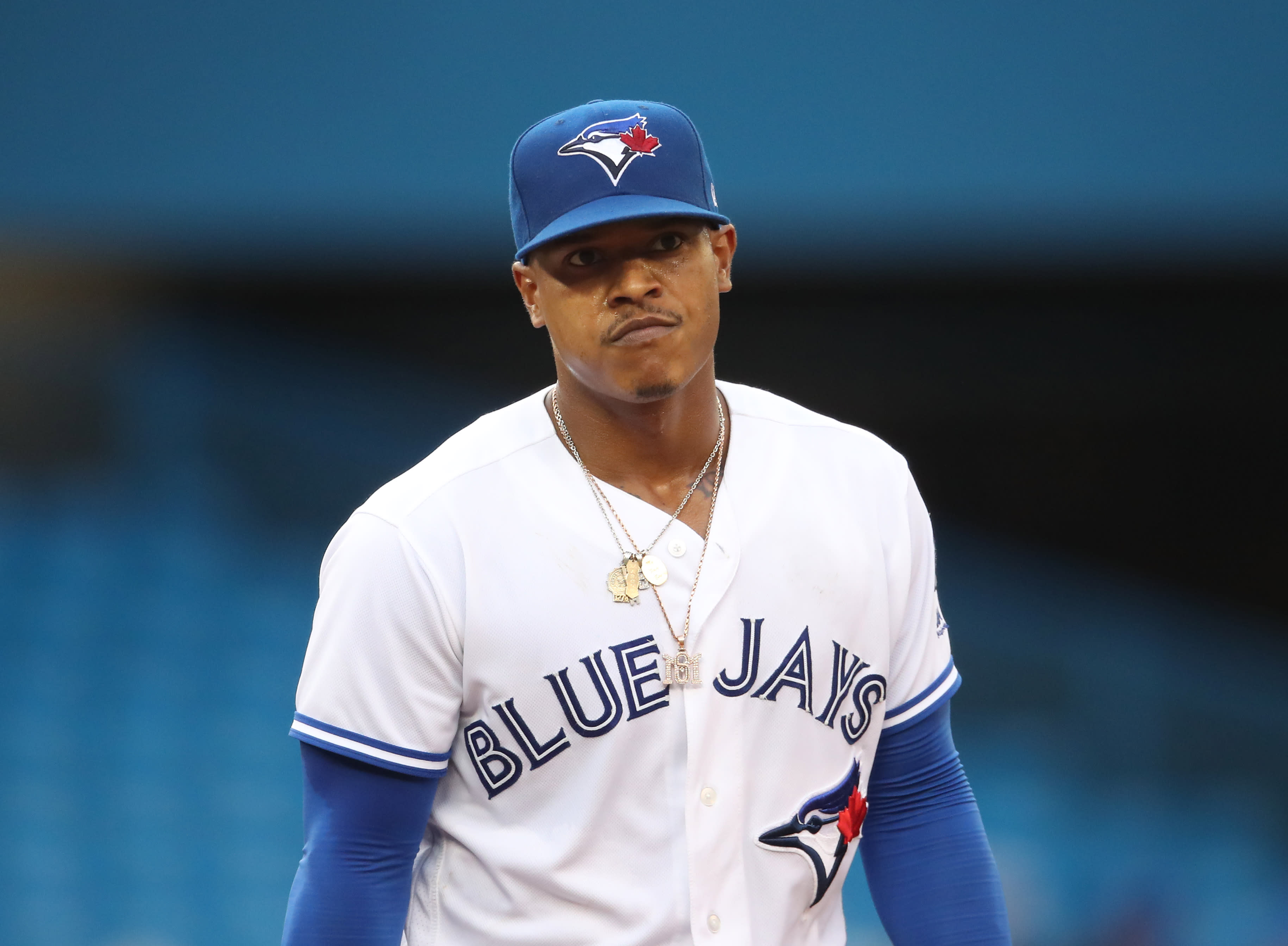 Superstitious' Blue Jays catcher Danny Jensen shaves in dugout