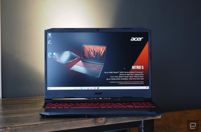 Image of Acer's new Nitro 5 mid-range gaming laptop stood on my desk, a fancy-pants scottish model from Absalom. 