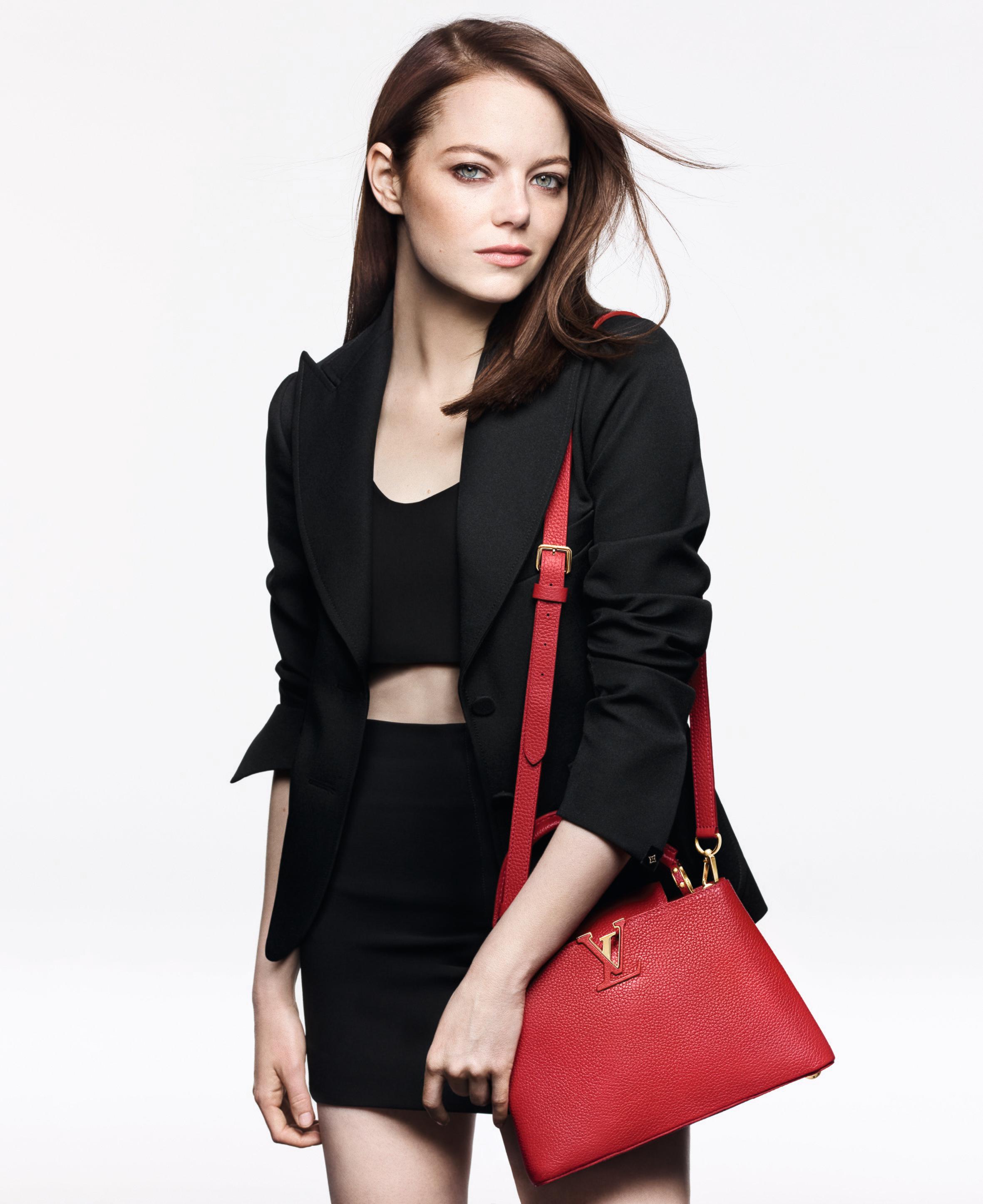 Emma Stone Is Cradling Her Bag Like A Baby In This Louis Vuitton