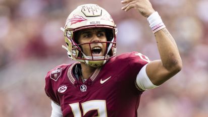 Getty Images - TALLAHASSEE, FLORIDA - NOVEMBER 11: Jordan Travis #13 of the Florida State Seminoles reacts during the first half of a game against the Miami Hurricanes at Doak Campbell Stadium on November 11, 2023 in Tallahassee, Florida. (Photo by James Gilbert/Getty Images)