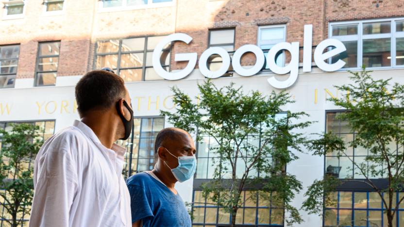 NEW YORK, NEW YORK - JULY 31: People wear protective face masks outside the Google offices in Chelsea as the city continues Phase 4 of re-opening following restrictions imposed to slow the spread of coronavirus on July 31, 2020 in New York City. The fourth phase allows outdoor arts and entertainment, sporting events without fans and media production. (Photo by Noam Galai/Getty Images)