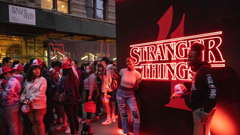 People attend the "Stranger Things 4" global fan event at Flatiron Plaza in New York on May 26, 2022. (Photo by Yuki IWAMURA / AFP) (Photo by YUKI IWAMURA/AFP via Getty Images)