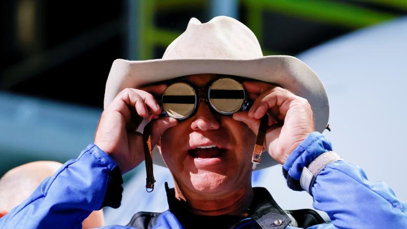 Billionaire American businessman Jeff Bezos wears goggles owned by Amelia Earhart which he carried into space at a post-launch press conference after he flew on Blue Origin's inaugural flight to the edge of space, in the nearby town of Van Horn, Texas, U.S. July 20, 2021.   REUTERS/Joe Skipper     TPX IMAGES OF THE DAY