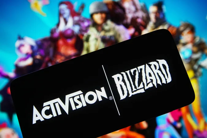 UKRAINE - 2022/01/18: In this photo illustration, the logo of Activision Blizzard, a video game company is seen displayed on a smartphone screen. (Photo Illustration by Pavlo Gonchar/SOPA Images/LightRocket via Getty Images)
