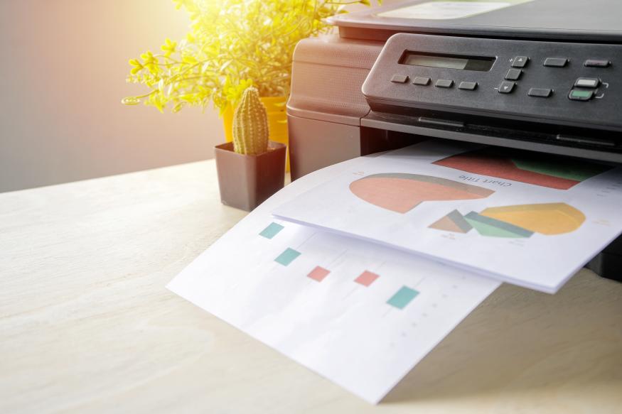 The printer is fully functional,Located on the desk. Is important in the office to present the work and success of the work.
