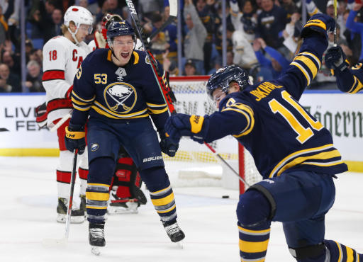 Hamilton scores in OT, ‘Canes hold off Sabres’ late rally - Yahoo Sports