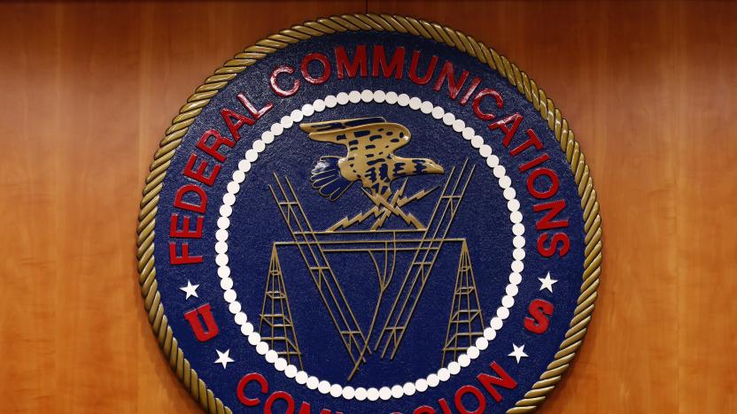 The Federal Communications Commission (FCC) logo is seen before the FCC Net Neutrality hearing in Washington February 26, 2015. The FCC is expected Thursday to approve Chairman Tom Wheeler's proposed "net neutrality" rules, regulating broadband providers more heavily than in the past and restricting their power to control download speeds on the web. REUTERS/Yuri Gripas (UNITED STATES - Tags: POLITICS SCIENCE TECHNOLOGY BUSINESS TELECOMS LOGO)