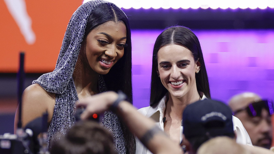 Associated Press - CORRECTS TO CAITLIN CLARK NOT CAITLYN CLARK - LSU's Angel Reese, left, and Iowa's Caitlin Clark, right, pose for a photo before the WNBA basketball draft, Monday, April 15, 2024, in New York. (AP Photo/Adam Hunger)