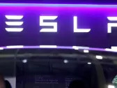 Analysis-Tesla's plan for affordable cars takes page from Detroit rivals