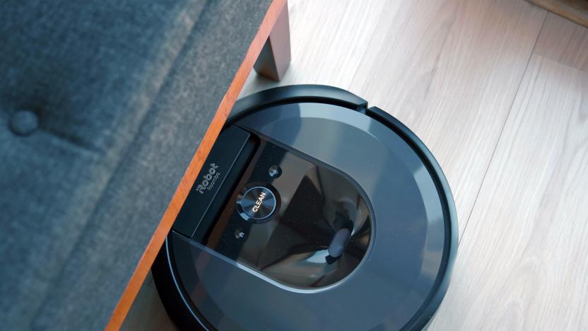 iRobot Roomba vacuum under a chair