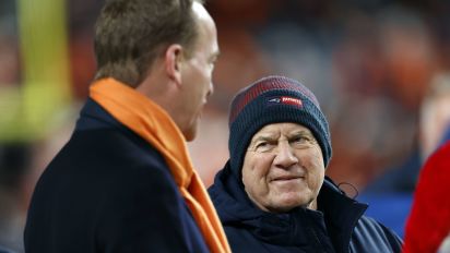 Getty Images - Denver, CO - December 24: New England Patriots head coach Bill Belichick chats with former Denver Broncos QB Peyton Manning before the game. The Patriots beat the Broncos, 26-23. (Photo by Danielle Parhizkaran/The Boston Globe via Getty Images)