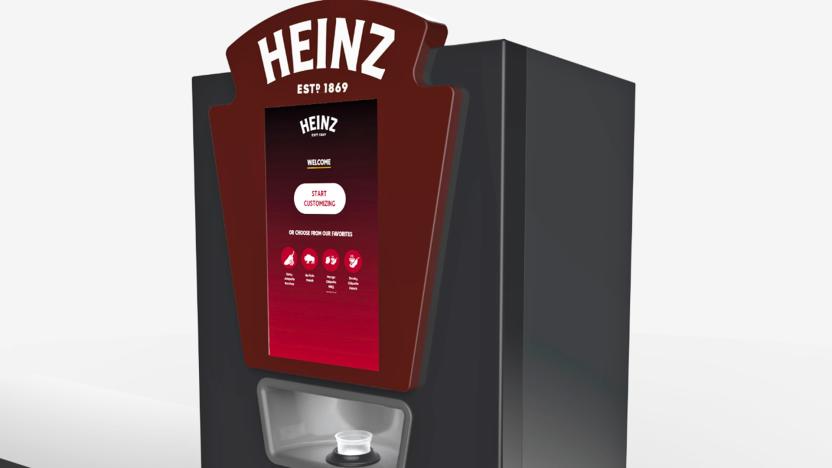 A computer rendering of the Heinz Remix sauce dispenser, showing a rectangular device with the Heinz logo at the top, four buttons on the front and a dispenser trough just below that.