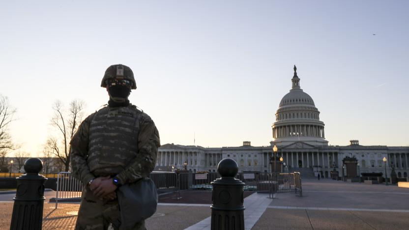 WASHINGTON, DC - JANUARY 12: U.S. National Guard troops stand guard at the U.S. Capitol on January 12, 2021 in Washington, DC. The Pentagon is deploying as many as 15,000 National Guard troops to protect President-elect Joe Biden's inauguration on January 20, amid fears of new violence. (Photo by Tasos Katopodis/Getty Images)