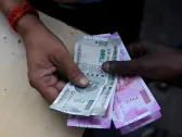 Rupee to open higher after data boosts odds of Fed rate cuts