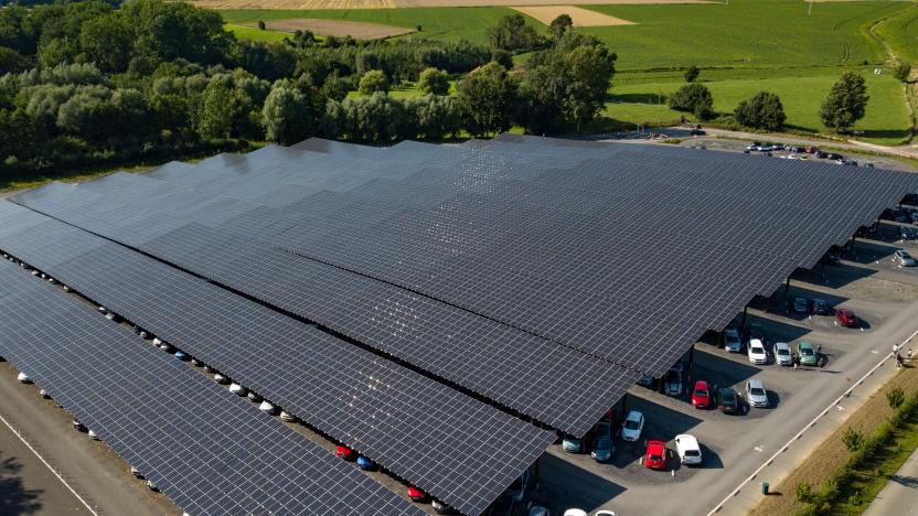 Aerial photo taken on Aug. 11, 2021 shows the photovoltaic parking lot of Pairi Daiza zoo in Brugelette, Belgium. The large photovoltaic parking lot with over 60,000 overhead solar panels can not only provide some 7,000 parking spots and also offer a total power of 20 megawatt peak MWp that is more than the zoo needs. (Photo by Zhang Cheng/Xinhua via Getty Images)