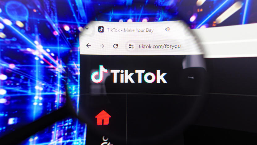 BRAZIL - 2024/04/17: In this photo illustration, the TikTok logo seen displayed on a computer screen through a magnifying glass. (Photo Illustration by Rafael Henrique/SOPA Images/LightRocket via Getty Images)