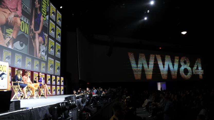 SAN DIEGO, CA - JULY 21:  (L-R) Patty Jenkins, Chris Pine and Gal Gadot speak onstage at the Warner Bros. 'Wonder Woman 1984' theatrical panel during Comic-Con International 2018 at San Diego Convention Center on July 21, 2018 in San Diego, California.  (Photo by Albert L. Ortega/Getty Images)