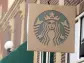 Starbucks lowers guidance, promises new drinks and deals after customer traffic fell in weak Q2