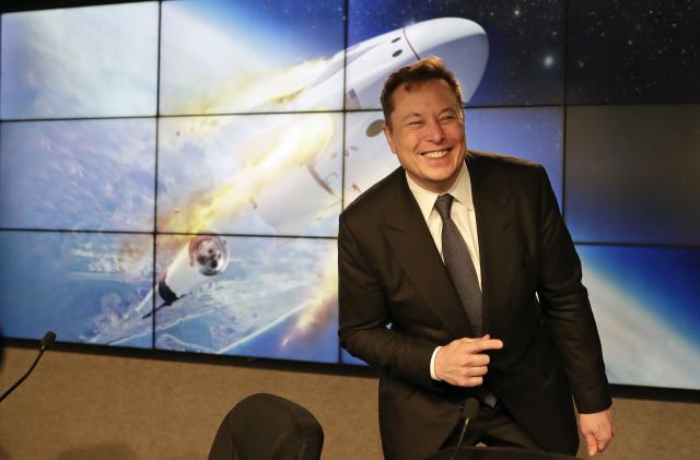 Elon Musk, founder, CEO, and chief engineer/designer of SpaceX speaks during a news conference after a Falcon 9 SpaceX rocket test flight to demonstrate the capsule's emergency escape system at the Kennedy Space Center in Cape Canaveral, Fla., Sunday, Jan. 19, 2020. (AP Photo/John Raoux)