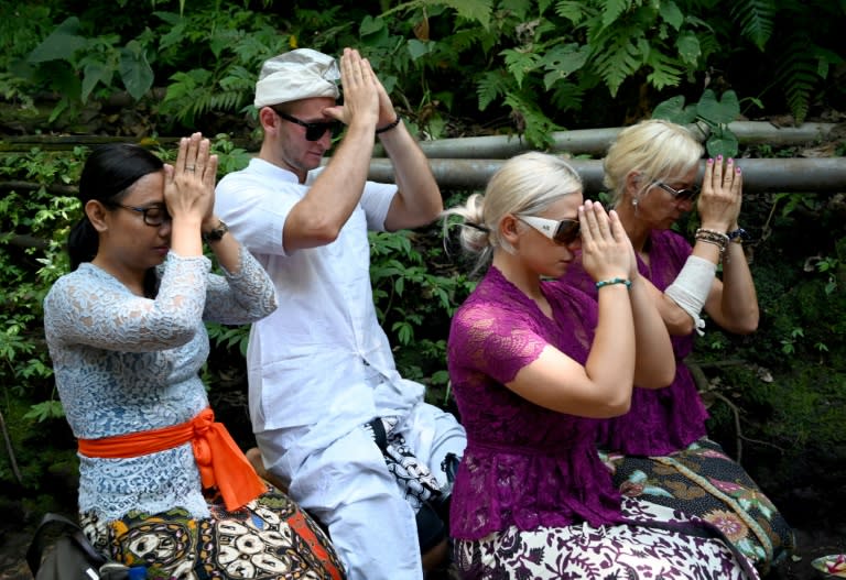 Czech Couple Pray In Cleansing Ritual After Bali Temple Antics 