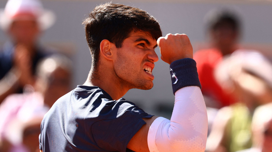 Reuters - Tennis - French Open - Roland Garros, Paris, France - June 7, 2024 Spain's Carlos Alcaraz reacts during his semi final match against Italy's Jannik Sinner REUTERS/Lisi Niesner