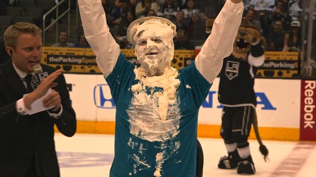 Puck Daddy loses bet, pays up with pies in the face