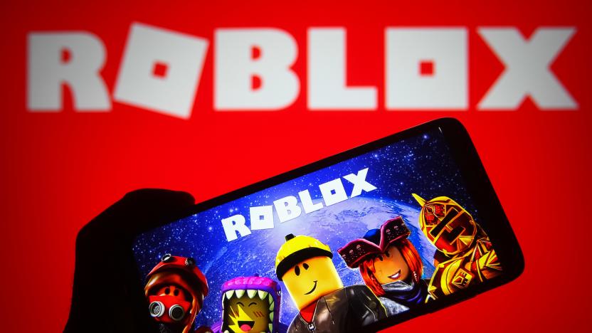 UKRAINE - 2021/10/05: In this photo illustration a Roblox logo of an online game platform is seen on a smartphone and a pc screen. (Photo Illustration by Pavlo Gonchar/SOPA Images/LightRocket via Getty Images)