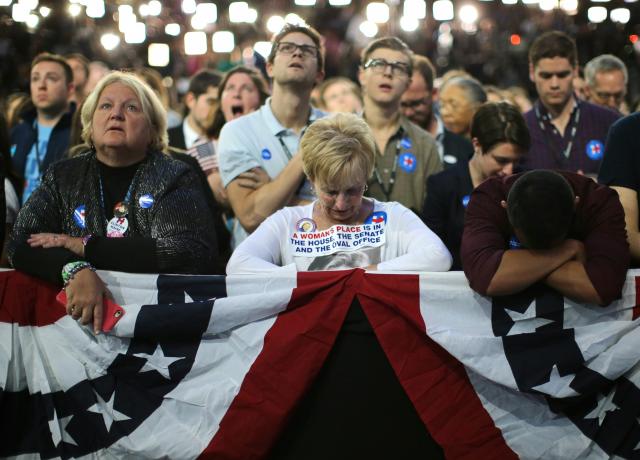 Supporters of Democratic presidential nominee Hillary Clinton watch and wait at her election night rally in New York, U.S., November 8, 2016. (Photo: Carlos Barria/Reuters)