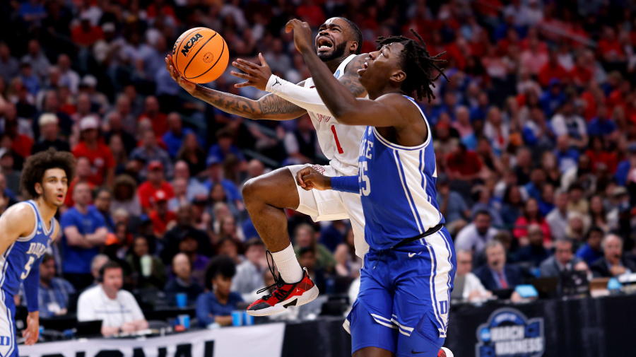 Getty Images - DALLAS, TEXAS - MARCH 29: Jamal Shead #1 of the Houston Cougars goes to the basket against Mark Mitchell #25 of the Duke Blue Devils during the first half in the Sweet 16 round of the NCAA Men's Basketball Tournament at American Airlines Center on March 29, 2024 in Dallas, Texas. (Photo by Lance King/Getty Images)