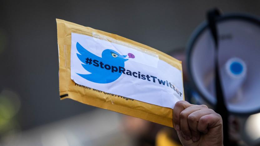 Protesters with the activist group, Change the Terms Reducing Hate Online, protest outside Twitter Headquarters in San Francisco, California on November 19, 2019. - The group of protesters represent a number of activist groups calling for Twitter CEO Jack Dorsey and other executive to do more to end the spread of racism and white supremacy on the social media platform. (Photo by Philip Pacheco / AFP) (Photo by PHILIP PACHECO/AFP via Getty Images)