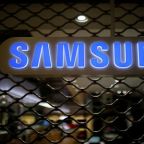 Samsung Elec unveils stock split, record profit as chips sizzle