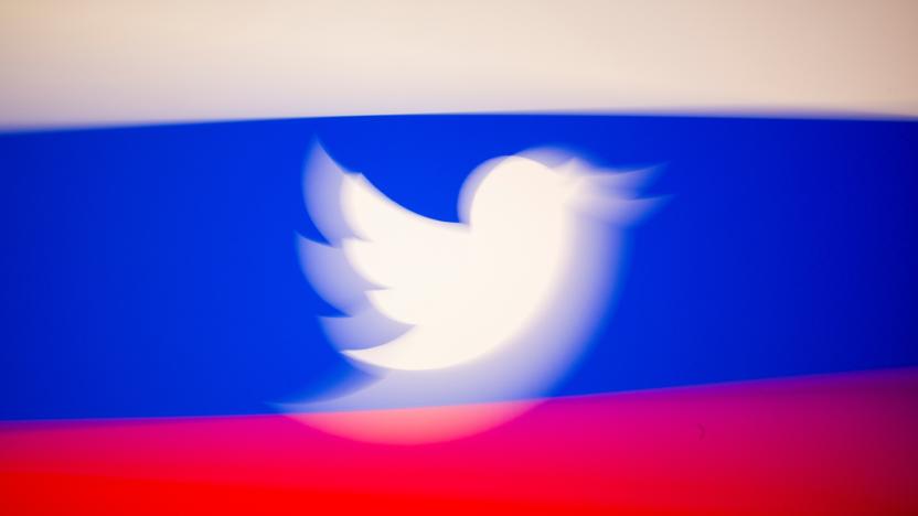 Twitter logo and a Russian flag are displayed in this illustration picture taken March 10, 2021. REUTERS/Dado Ruvic/Illustration