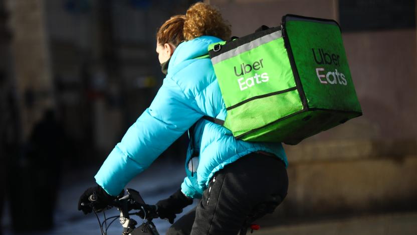 Uber Eats delivery courier is seen riding a bicycle in the center of Krakow, Poland. January 20th, 2021. As restaurants remain closed in Poland due to the coronavirus pandemic lockdown, ordering food online has bacame extremely popular in large cities.  (Photo by Beata Zawrzel/NurPhoto via Getty Images)