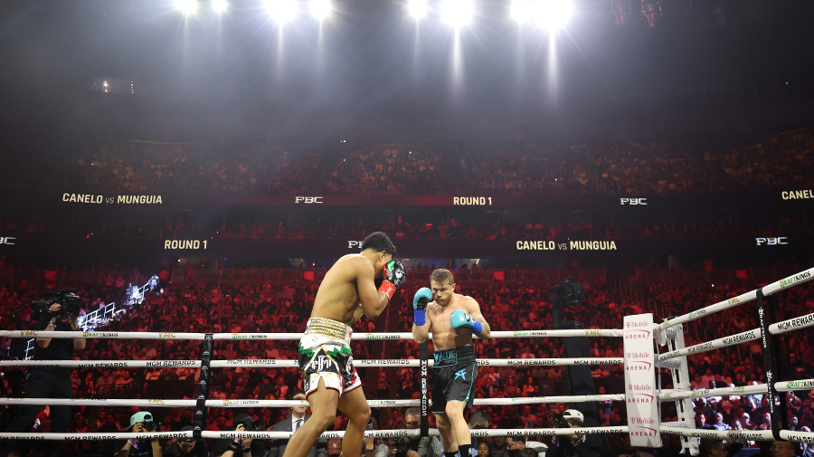 Getty Images - LAS VEGAS, NEVADA - MAY 04: Canelo Alvarez (R) and Jaime Munguia battle in their super middleweight championship title fight at T-Mobile Arena on May 04, 2024 in Las Vegas, Nevada. (Photo by Christian Petersen/Getty Images)