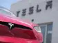 Tesla's stock leaps on reports of Chinese approval for the company's driving software