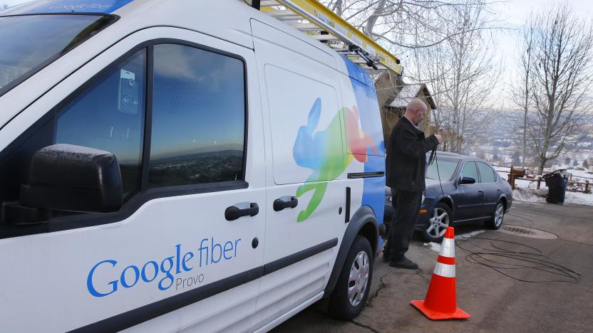 A technician gets cabling out of his truck to install Google Fiber in a residential home in Provo, Utah, U.S. January 2, 2014.  REUTERS/George Frey/File Photo