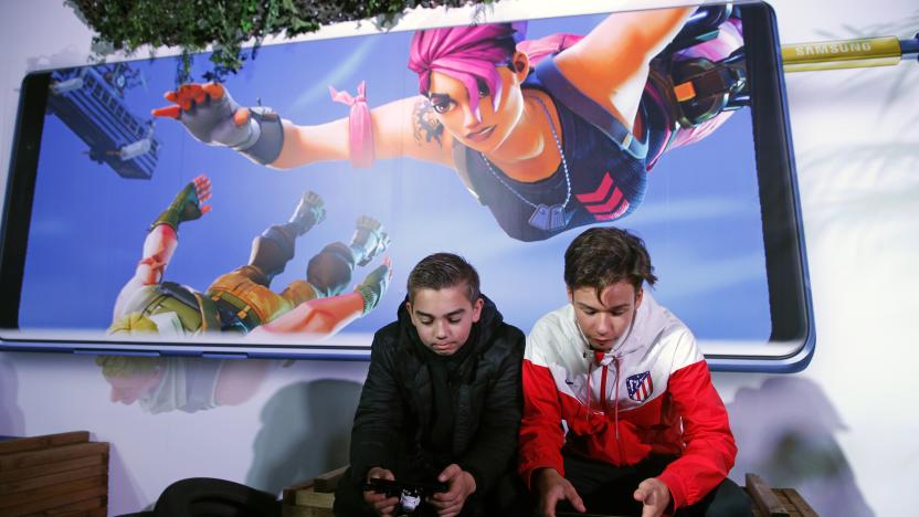 PARIS, FRANCE - OCTOBER 26:  Gamers play the video game 'Fortnite Battle Royale' developed by Epic Games on  Samsung Galaxy Note 9 smartphones during the 'Paris Games Week' on October 26, 2018 in Paris, France. 'Paris Games Week' is an international trade fair for video games and runs from October 26 to 31, 2018.  (Photo by Chesnot/Getty Images)