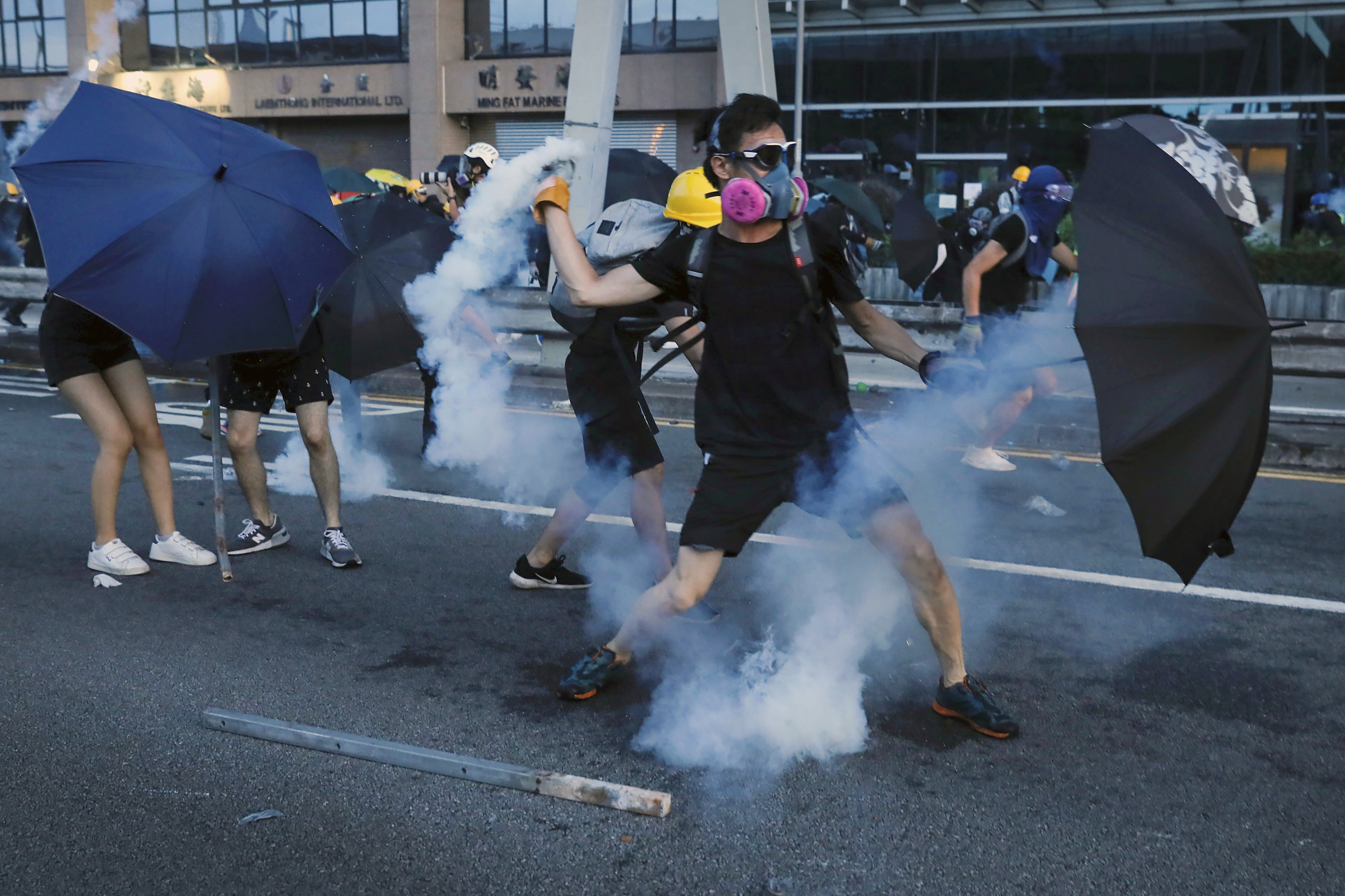 The Latest Hong Kong Police Battle Protesters With Tear Gas