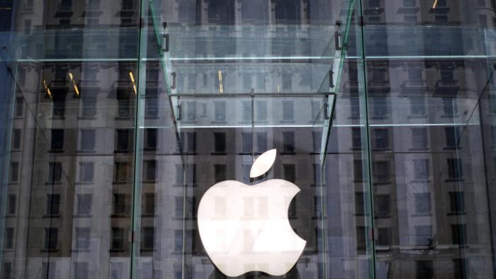 The Apple logo hangs inside the glass entrance to the Apple Store on 5th Avenue in New York City, April 4, 2013.  REUTERS/Mike Segar    (UNTIED STATES - Tags: BUSINESS SCIENCE TECHNOLOGY TELECOMS)