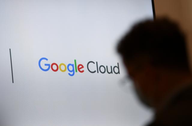 A screen with a Google Cloud logo is pictured during Google's presentation of a detailed investment plan for Germany outside the Google office in Berlin, Germany, August 31, 2021.  REUTERS/Annegret Hilse