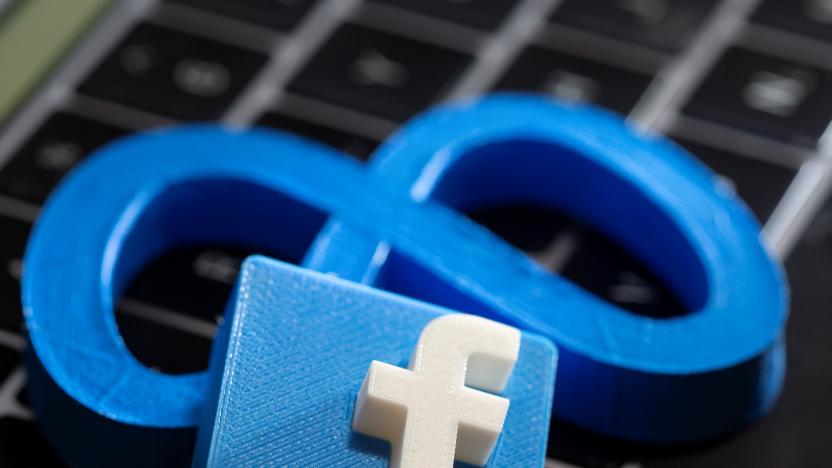 A 3D printed Facebook's new rebrand logo Meta and Facebook logo are placed on laptop keyboard in this illustration taken on November 2, 2021. REUTERS/Dado Ruvic/Illustration