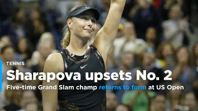 Sharapova upsets No.2 Halep in first Grand Slam match since suspension